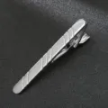 Silver metal tie clip close up, elegant business suit accessory for men's formal wear. - Style 10