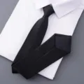 Classic black men business tie paired with white dress shirt detail shot for professional look. - Style 015