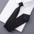 Classic black necktie for men with fine diagonal stripes, elegant formal business wear accessory. - Style 016