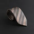 Men's business formal striped necktie classic vintage design neckwear detail view - Hand-Tied / Champagne Double Striped