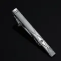 Close-up detail shot of a silver men's tie clip featuring geometric lines and crystal. - Silver 07 Style