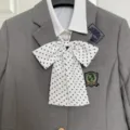 Grey JK uniform blazer with white shirt and cute polka dot bow tie, perfect for students. - White Polka Dot Bow Tie