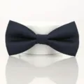 Detailed view of the dark blue herringbone men's bow tie, perfect for formal events. - Navy Wave Bowtie