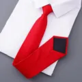 Classic red textured formal business necktie displayed on a clean white dress shirt. - Style 030