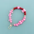 Sweet candy color beaded phone charm strap detail showing cute star and heart charms. - X106-7