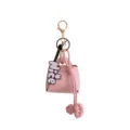 Detailed view of the pink PU leather mini bag keychain pendant with gold hardware and charm. - Pink (B430-5)