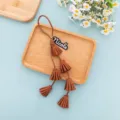 Brown PU leather tassel keychain and cute bag charm with personalized name tag. - Brown Style (B442-5)