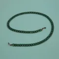 Dark green acrylic eyeglass chain detail, showing the link structure and durable rubber loop connectors. - Two-tone Dark Green