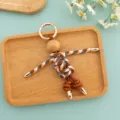 Handmade woven doll keychain pendant, cute wooden bead head and metal accents for bags. - Blue-Green Colorblock Woven Rope