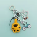 Cute cartoon cat paw keychain pendant with rhinestones number five bicycle and camera charms. - Yellow Cat Claw Style (B410-1) / Yellow