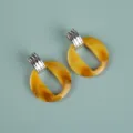 Oversize acrylic earrings in amber yellow and silver, stylish geometric drop earrings for women. - Exaggerated Geometric Hoop / Turmeric