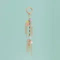Detail view of the colorful macaron resin star and chain charm for bags and keys. - B386-2