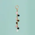 Detailed close-up view of colorful resin bead and faux pearl mixed charm with gold chain. - B386-4