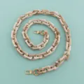 Dettaglio catena in acrilico tartarugato con moschettoni dorati per borse fai da te eleganti. - Beige Bicolore