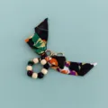 Wooden bead and floral silk scarf bow keychain detail shot, showing cute bag charm and hardware. - B346-N (Black Floral Print)