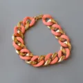 Chunky chain necklace featuring matte peach acrylic and gold links, stylish piece. - Matte Pink Mixed Gold