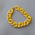 Chunky chain necklace with matte yellow acrylic and glossy gold links, stylish collar. - Yellow Rubber and Gold