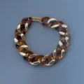 Chic chunky chain necklace featuring tortoiseshell acrylic and polished gold links for women. - Coffee & Gold