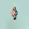 Close-up detail of DIY leather letter keychain charm with woven cord and colorful resin rings - Letter W Style (B402-W)
