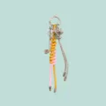 Chic alloy keychain and bag charm featuring knotted pink yellow cords and crystal bow details. - Pink Yellow