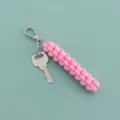 Rosa gewebter Nylonseil Schlüsselanhänger Taschenanhänger mit Metallschlüssel minimalistisch - Rosa