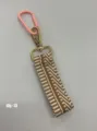 Short woven lanyard keychain with brown white geometric pattern, metal clasp and pink hook. - Style DIY-13