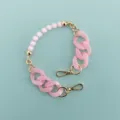 Pink short chain strap variant with acrylic beads and resin links, cute phone case accessory. - Pink Round Bead Resin Chain