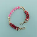 Short phone case chain with pink star beads and red resin links, stylish accessory. - Translucent Star Beaded Chain