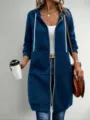 Detailed view of the women's long hooded zip-up sweatshirt in dark blue with pockets. - Sapphire Blue