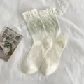 Cute aesthetic argyle crew socks in light green and cream, soft cotton fall fashion hosiery - One Size / Argyle