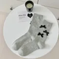 Grey ribbed mid-tube women socks featuring cute black bow details, sweet aesthetic daily wear. - Gray + Black Bow