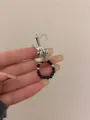 Detail shot of unique Y2K silver teapot sculpture ring with black beaded elastic band. - Teapot Flower Style (R-803) / Black and Silver (A)