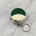 Round metal pill box keychain with green white beaded top lid compact portable storage trinket - Green And White Semicircle Style