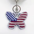 Handgefertigter Perlen-Schlüsselanhänger in Schmetterlingsform mit US-Flaggen-Design. - Schmetterling-Stil / 1 / Regenbogen