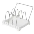 Adjustable kitchen pot lid organizer rack with white plastic base and stainless steel wire dividers. - White