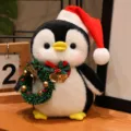 Cute Christmas penguin plush toy with Santa hat, soft stuffed animal doll for kids holiday gift. - Christmas Wreath Penguin