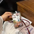 Mini crossbody phone bag with artistic illustration, lightweight PU leather shoulder bag for women. - Desk Girl