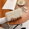 Women's quilted long wallet zip-around clutch purse with wrist strap elegant beige chic - Triangle Lattice - White