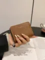 Compact brown PU leather zipper card holder with cute heart metal pendant for daily use women. - Brown