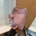 Chic purple mini phone bag for women with cute elephant charm and crossbody strap. Trendy. - Litchi Pattern - Purple