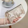 Women's long embroidered zip wallet with elegant pearl wrist strap, chic Chinese style. - Large Flower-Gold + Pearl Strap