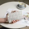 Elegant white tweed clutch purse with pearl wrist strap and gold accents for women fashion. - Long / With Artificial Pearl Strap / Off White