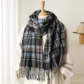 Detail view of the cozy blue plaid cashmere-feel scarf with fringe, perfect winter style. - WT272-4 Blue and Black
