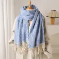 Blue paisley patterned winter cashmere feel scarf detail view with elegant tassel fringe design. - Blue