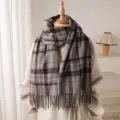 Cozy plaid scarf detail close-up showing soft cashmere-like texture and elegant fringe. - WT272-6 Gray