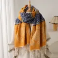 Detailed view of winter cashmere-feel plaid floral tassel scarf, warm fashion accessory. - Yellow