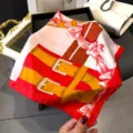 Elegant red silk square scarf with vintage harness and bow print, luxurious women accessory. - Red Edge