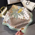 Detail view of a chic multi-style printed square silk scarf with elegant chic pattern. - Green Edge