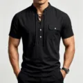 Detailed view of casual men's black linen henley shirt with chest pocket and lace-up collar. - S / Black