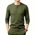Detail view of men's olive green long sleeve waffle knit henley shirt, textured grid. - Army Green